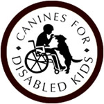 Circular logo reading Canines For Disabled Kids, showing a child in a wheelchair facing a dog