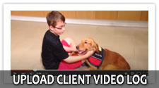 A button from the Canines 4 Hope site reading Upload Client Video Log, over a photograph of a boy kneeling on a wood floor beside a yellow dog in a red service vest.